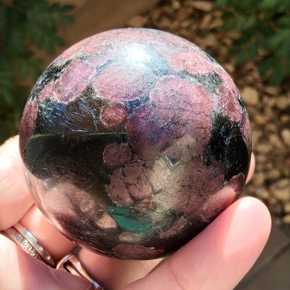 Vibrant Garnet & Astrophyllite Sphere - Picture 11 of 16